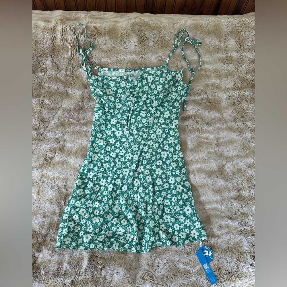 Turquoise floral pattern sundress. NWT.